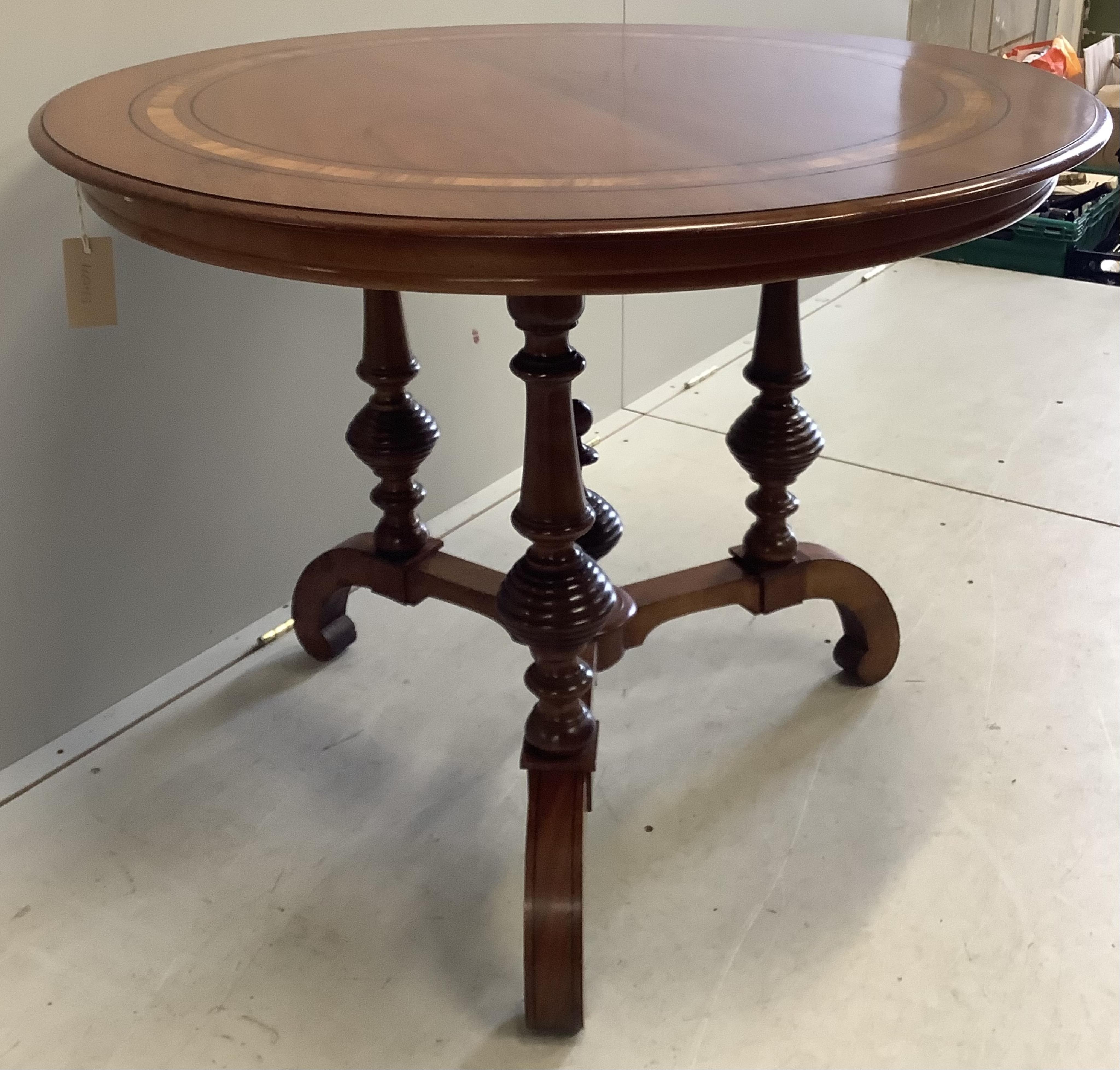 A 19th century Continental circular centre table, diameter 94cm, height 75cm. Condition - good